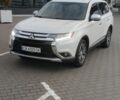 Белый Мицубиси Аутлендер, объемом двигателя 2.4 л и пробегом 119 тыс. км за 17800 $, фото 1 на Automoto.ua