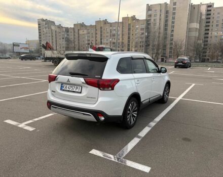 Белый Мицубиси Аутлендер, объемом двигателя 2.4 л и пробегом 168 тыс. км за 19500 $, фото 4 на Automoto.ua