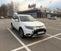 Белый Мицубиси Аутлендер, объемом двигателя 2.4 л и пробегом 168 тыс. км за 19500 $, фото 3 на Automoto.ua