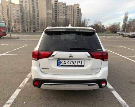 Белый Мицубиси Аутлендер, объемом двигателя 2.4 л и пробегом 168 тыс. км за 19500 $, фото 1 на Automoto.ua