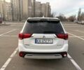 Белый Мицубиси Аутлендер, объемом двигателя 2.4 л и пробегом 168 тыс. км за 19500 $, фото 1 на Automoto.ua