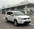 Белый Мицубиси Аутлендер, объемом двигателя 2 л и пробегом 260 тыс. км за 4150 $, фото 1 на Automoto.ua