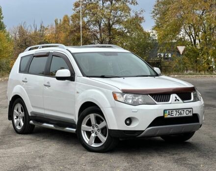 Білий Міцубісі Аутлендер, об'ємом двигуна 2.4 л та пробігом 160 тис. км за 9299 $, фото 1 на Automoto.ua