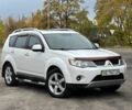 Білий Міцубісі Аутлендер, об'ємом двигуна 2.4 л та пробігом 160 тис. км за 9299 $, фото 1 на Automoto.ua