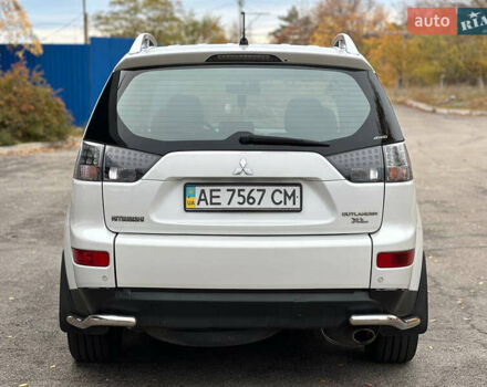 Белый Мицубиси Аутлендер, объемом двигателя 2.36 л и пробегом 160 тыс. км за 9299 $, фото 6 на Automoto.ua