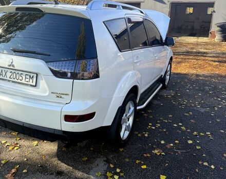 Белый Мицубиси Аутлендер, объемом двигателя 2.4 л и пробегом 230 тыс. км за 9000 $, фото 4 на Automoto.ua