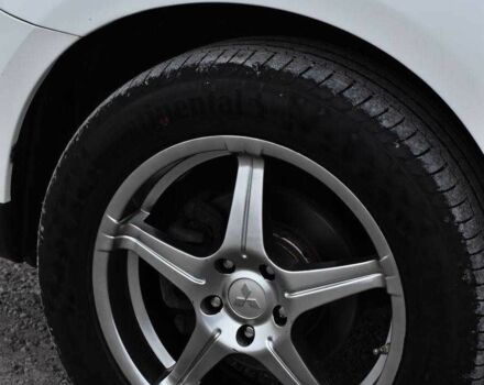 Білий Міцубісі Аутлендер, об'ємом двигуна 2.2 л та пробігом 275 тис. км за 9650 $, фото 8 на Automoto.ua