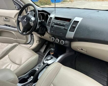 Білий Міцубісі Аутлендер, об'ємом двигуна 2.4 л та пробігом 160 тис. км за 9299 $, фото 14 на Automoto.ua