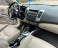 Білий Міцубісі Аутлендер, об'ємом двигуна 2.4 л та пробігом 160 тис. км за 9299 $, фото 14 на Automoto.ua