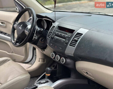 Белый Мицубиси Аутлендер, объемом двигателя 2.36 л и пробегом 160 тыс. км за 9299 $, фото 23 на Automoto.ua