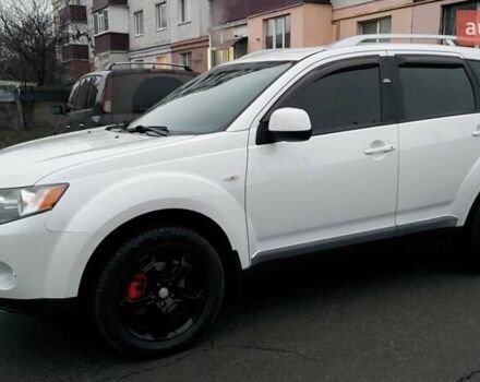 Белый Мицубиси Аутлендер, объемом двигателя 2.36 л и пробегом 186 тыс. км за 9250 $, фото 2 на Automoto.ua