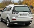 Білий Міцубісі Аутлендер, об'ємом двигуна 2.4 л та пробігом 160 тис. км за 9299 $, фото 5 на Automoto.ua