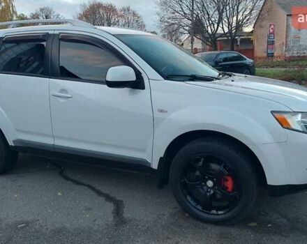 Белый Мицубиси Аутлендер, объемом двигателя 2.36 л и пробегом 185 тыс. км за 8950 $, фото 7 на Automoto.ua