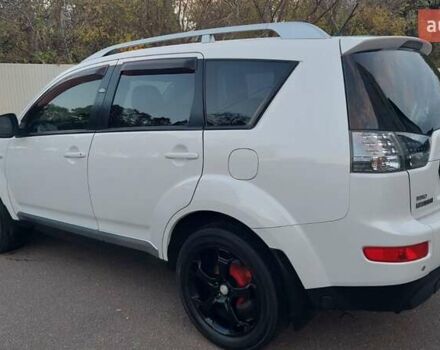 Белый Мицубиси Аутлендер, объемом двигателя 2.36 л и пробегом 185 тыс. км за 8950 $, фото 16 на Automoto.ua