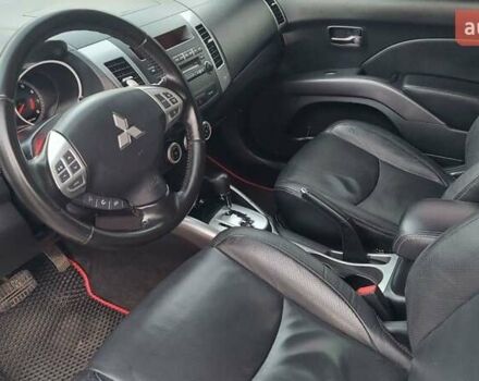 Белый Мицубиси Аутлендер, объемом двигателя 2.36 л и пробегом 186 тыс. км за 9250 $, фото 15 на Automoto.ua
