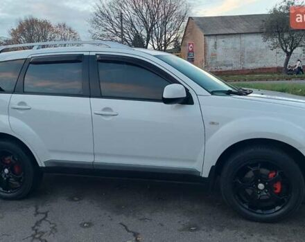 Белый Мицубиси Аутлендер, объемом двигателя 2.36 л и пробегом 185 тыс. км за 8950 $, фото 6 на Automoto.ua