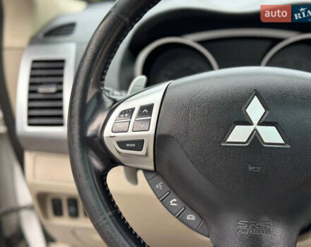 Белый Мицубиси Аутлендер, объемом двигателя 2.36 л и пробегом 160 тыс. км за 9299 $, фото 34 на Automoto.ua