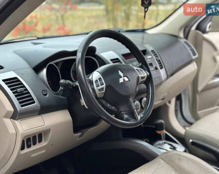 Белый Мицубиси Аутлендер, объемом двигателя 2.36 л и пробегом 160 тыс. км за 9299 $, фото 13 на Automoto.ua