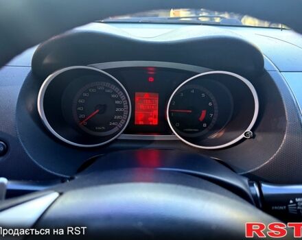 Белый Мицубиси Аутлендер, объемом двигателя 2.4 л и пробегом 230 тыс. км за 9000 $, фото 12 на Automoto.ua