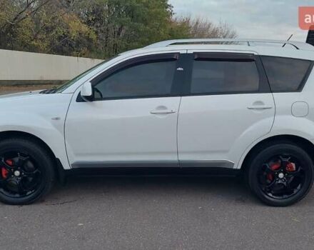 Белый Мицубиси Аутлендер, объемом двигателя 2.36 л и пробегом 185 тыс. км за 8950 $, фото 18 на Automoto.ua
