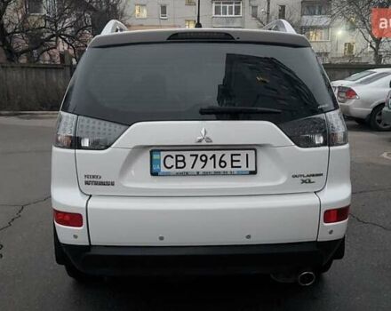 Белый Мицубиси Аутлендер, объемом двигателя 2.36 л и пробегом 186 тыс. км за 9250 $, фото 10 на Automoto.ua