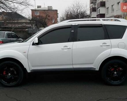 Белый Мицубиси Аутлендер, объемом двигателя 2.36 л и пробегом 186 тыс. км за 9250 $, фото 4 на Automoto.ua