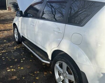 Білий Міцубісі Аутлендер, об'ємом двигуна 2.4 л та пробігом 230 тис. км за 9000 $, фото 12 на Automoto.ua