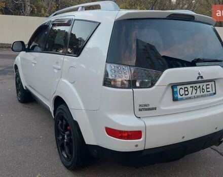 Белый Мицубиси Аутлендер, объемом двигателя 2.36 л и пробегом 185 тыс. км за 8950 $, фото 17 на Automoto.ua