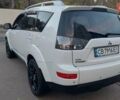 Белый Мицубиси Аутлендер, объемом двигателя 2.36 л и пробегом 185 тыс. км за 8950 $, фото 17 на Automoto.ua