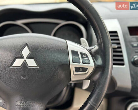 Белый Мицубиси Аутлендер, объемом двигателя 2.36 л и пробегом 160 тыс. км за 9299 $, фото 35 на Automoto.ua