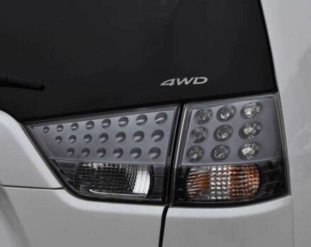 Білий Міцубісі Аутлендер, об'ємом двигуна 2.2 л та пробігом 275 тис. км за 9650 $, фото 7 на Automoto.ua