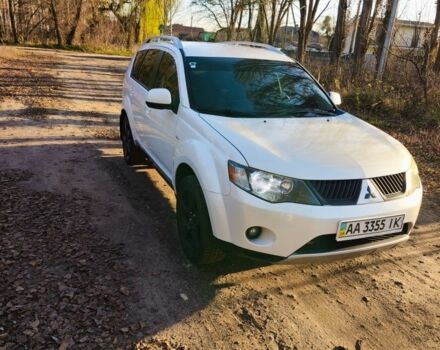 Белый Мицубиси Аутлендер, объемом двигателя 2.4 л и пробегом 149 тыс. км за 9000 $, фото 1 на Automoto.ua