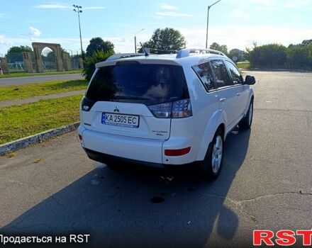 Белый Мицубиси Аутлендер, объемом двигателя 3 л и пробегом 200 тыс. км за 9000 $, фото 2 на Automoto.ua