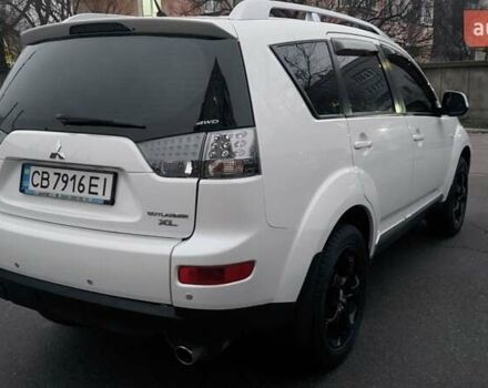 Белый Мицубиси Аутлендер, объемом двигателя 2.36 л и пробегом 186 тыс. км за 9250 $, фото 9 на Automoto.ua