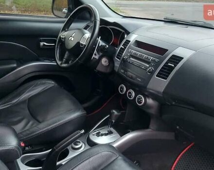 Белый Мицубиси Аутлендер, объемом двигателя 2.36 л и пробегом 185 тыс. км за 8950 $, фото 27 на Automoto.ua