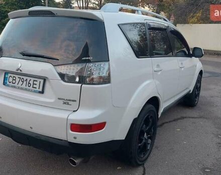 Белый Мицубиси Аутлендер, объемом двигателя 2.36 л и пробегом 185 тыс. км за 8950 $, фото 13 на Automoto.ua