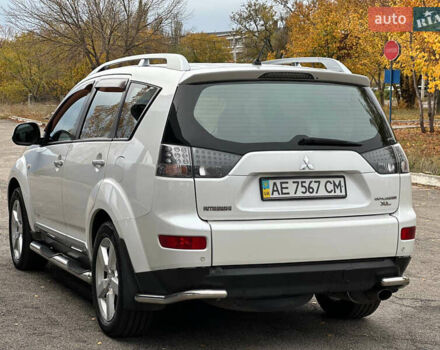 Белый Мицубиси Аутлендер, объемом двигателя 2.36 л и пробегом 160 тыс. км за 9299 $, фото 7 на Automoto.ua