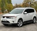Білий Міцубісі Аутлендер, об'ємом двигуна 2.4 л та пробігом 160 тис. км за 9299 $, фото 1 на Automoto.ua