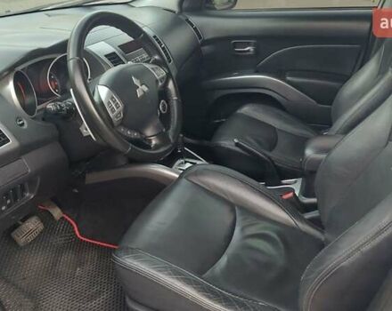 Белый Мицубиси Аутлендер, объемом двигателя 2.36 л и пробегом 185 тыс. км за 8950 $, фото 20 на Automoto.ua