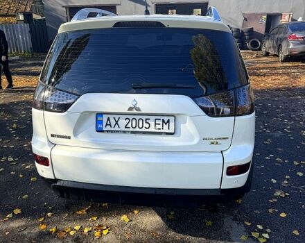 Белый Мицубиси Аутлендер, объемом двигателя 2.4 л и пробегом 230 тыс. км за 9000 $, фото 6 на Automoto.ua