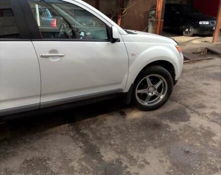 Білий Міцубісі Аутлендер, об'ємом двигуна 2.18 л та пробігом 275 тис. км за 9500 $, фото 12 на Automoto.ua