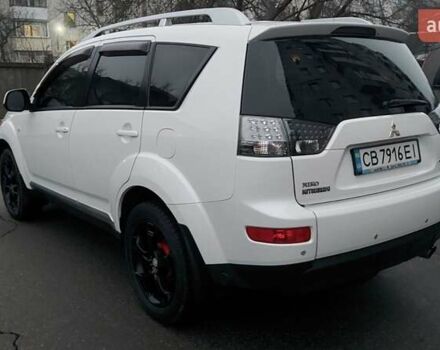 Белый Мицубиси Аутлендер, объемом двигателя 2.36 л и пробегом 186 тыс. км за 9250 $, фото 12 на Automoto.ua