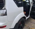 Білий Міцубісі Аутлендер, об'ємом двигуна 2.36 л та пробігом 185 тис. км за 9000 $, фото 7 на Automoto.ua