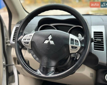 Белый Мицубиси Аутлендер, объемом двигателя 2.36 л и пробегом 160 тыс. км за 9299 $, фото 33 на Automoto.ua