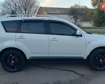 Белый Мицубиси Аутлендер, объемом двигателя 2.36 л и пробегом 185 тыс. км за 8950 $, фото 9 на Automoto.ua
