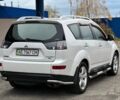 Білий Міцубісі Аутлендер, об'ємом двигуна 2.4 л та пробігом 160 тис. км за 9299 $, фото 3 на Automoto.ua