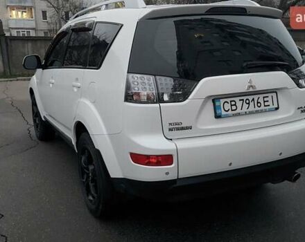 Белый Мицубиси Аутлендер, объемом двигателя 2.36 л и пробегом 186 тыс. км за 9250 $, фото 11 на Automoto.ua