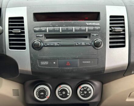 Білий Міцубісі Аутлендер, об'ємом двигуна 2.4 л та пробігом 160 тис. км за 9299 $, фото 20 на Automoto.ua