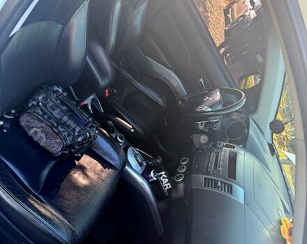 Белый Мицубиси Аутлендер, объемом двигателя 2.4 л и пробегом 230 тыс. км за 9000 $, фото 5 на Automoto.ua