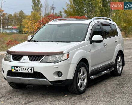 Белый Мицубиси Аутлендер, объемом двигателя 2.36 л и пробегом 160 тыс. км за 9299 $, фото 3 на Automoto.ua
